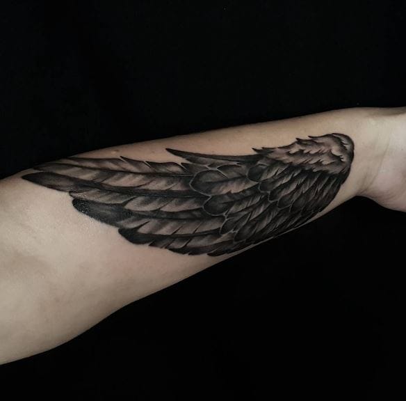 angel wing tattoo arm