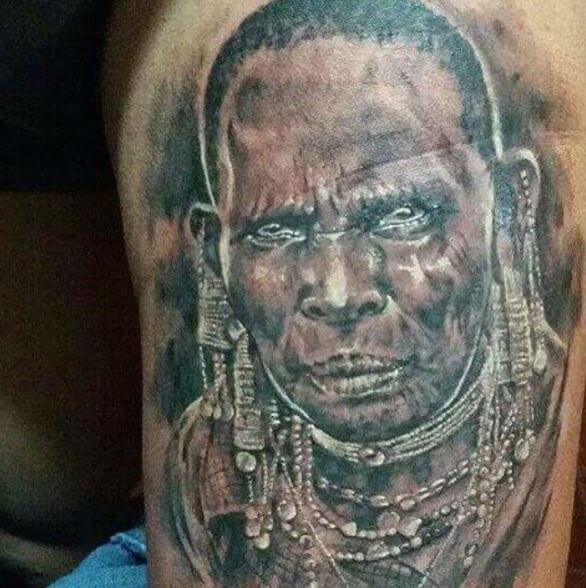 African Old Lady Tattoos Design On Biceps