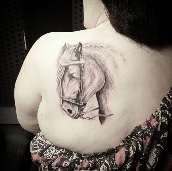 Black And Grey Horse Tattoo On Back