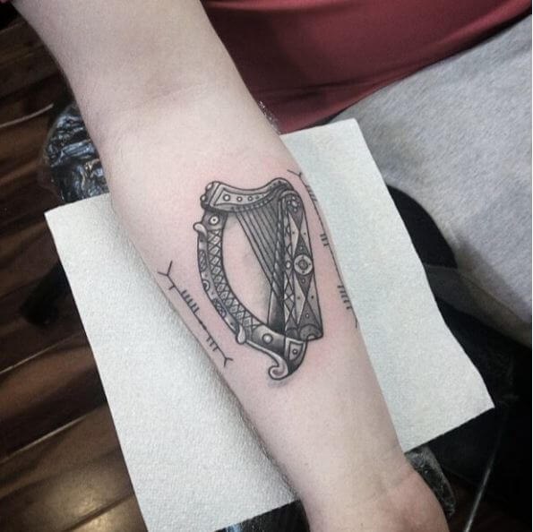 Old School Haro Irish Tattoo Design On Forearm