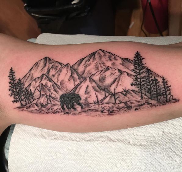 Bear With Forest Tattoos On Inner Biceps