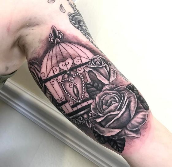 Bird Cage With Rose On Inner Bicep Tattoos