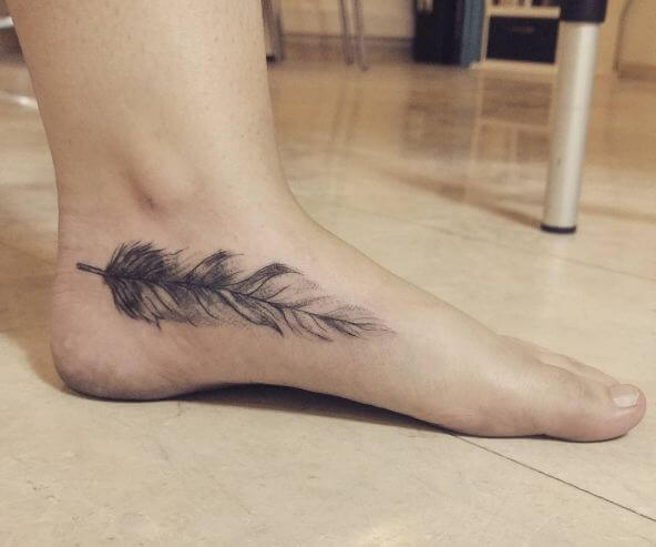 Feather Tattoos On Foot For Girls