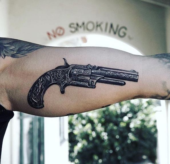 Gun Tattoos On Inner Bicep