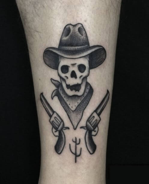 Skull And Guns Tattoo