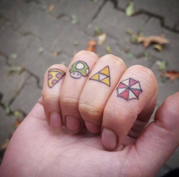 Zelda Knuckle Tattoos