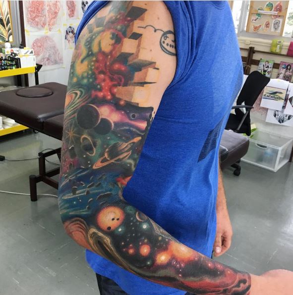 Amazing Colored Planet Tattoos Design And Ideas