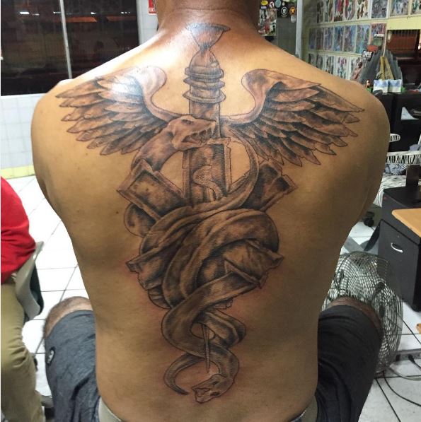 Christian And Wing Full Back Tattoos
