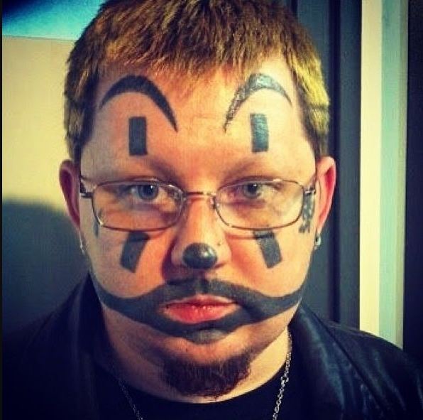 Funny Bad Face Tattoo Design