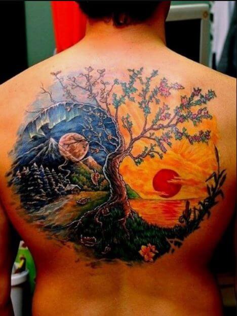 Guys Sun And Moon Tattoo On Back