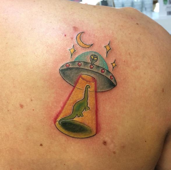 Small Alien UFO Tattoos Design On Women Upper Backside