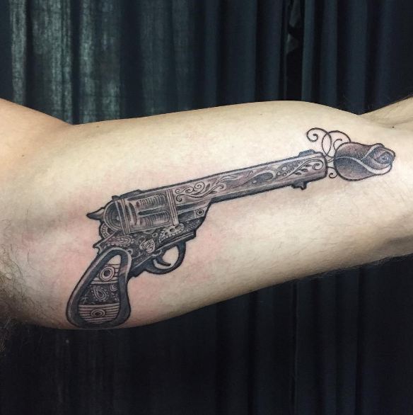 Bicep Gun Tattoos