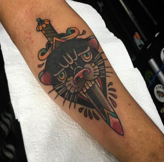 Black Panther With Dagger Tattoos