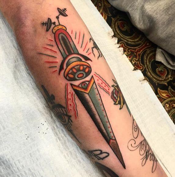 Dagger Tattoos On Calf