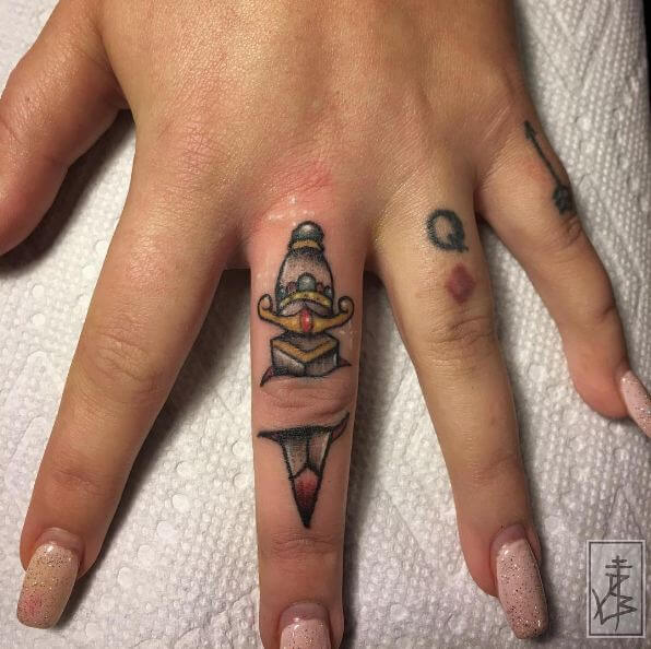 Dagger Tattoos On Finger