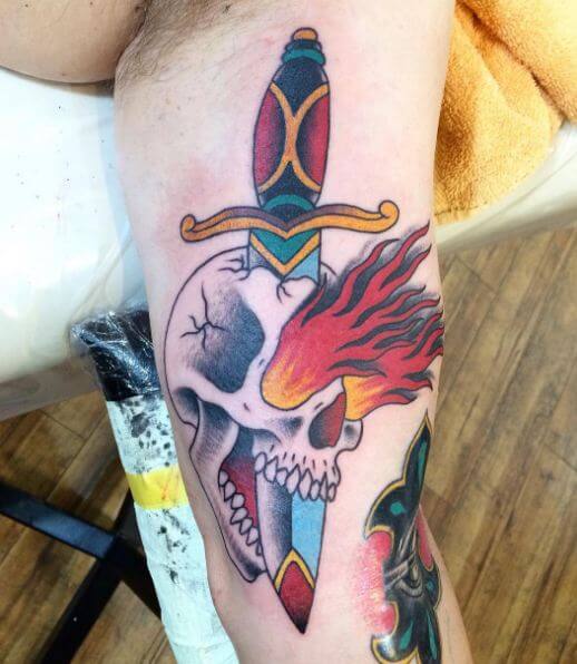 Skull With Dagger Tattoos