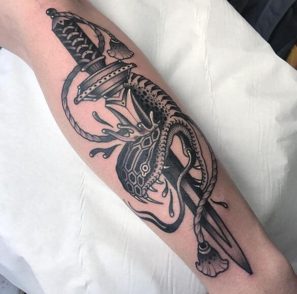 Snake With Dagger Tattoos