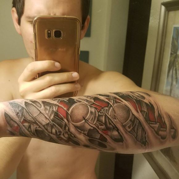 Bio Mechanical Tattoo On Arm 18
