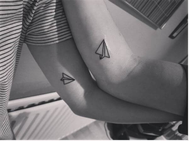 Black And White Sibling Tattoos Design