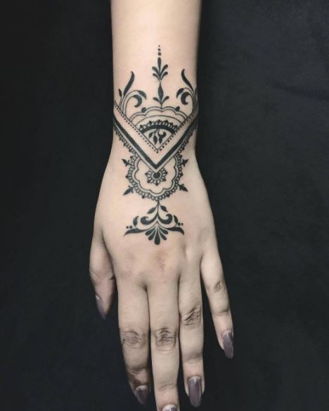 Black Work Tattoo On Wrist