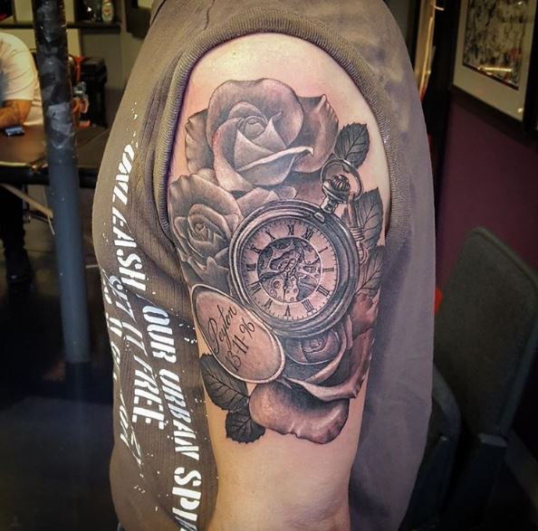 Clock Watch And Floral Tattoos Design On Biceps