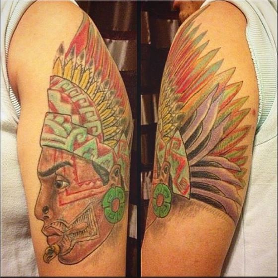 Colored Aztec Tattoos Design On Biceps
