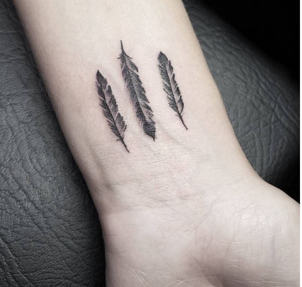 Micro Baby Feather Tattoos Design