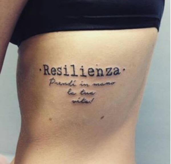 One Word Tattoos Design On Ribcage