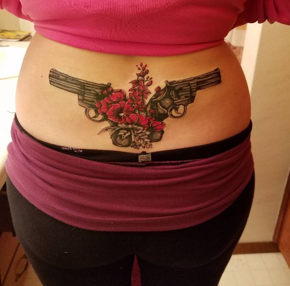 Gun Lower Back Tattoos