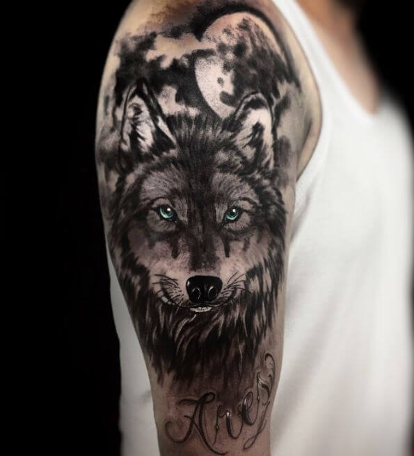 Wolf tattoo on the left shoulder and chest