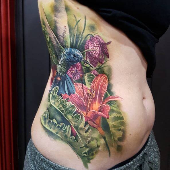 Colored Hummingbird Tattoos Design On Girls Stomach