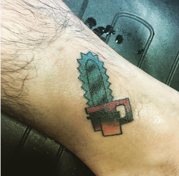 Cute Little Chainsaw Ankle Tattoos Design For Man