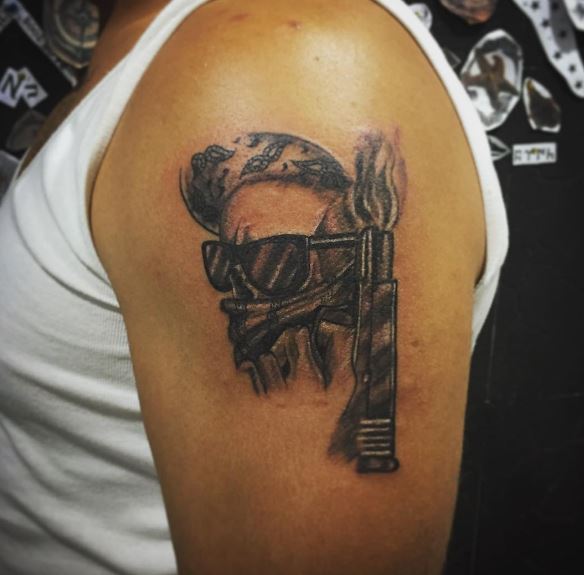 Gangsta Tattoos Design On Biceps
