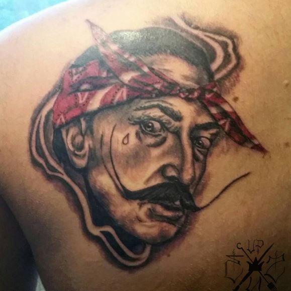 Gangsta Tattoos Design On Upper Backside
