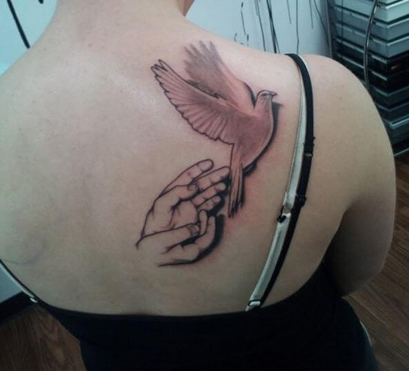 Hand And Dove Tattoos For Woman
