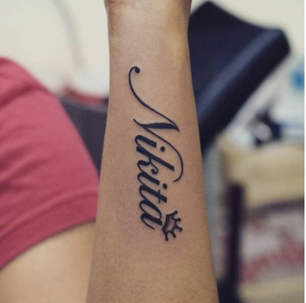 Nikita Name Tattoo Design On Forearm For Girls