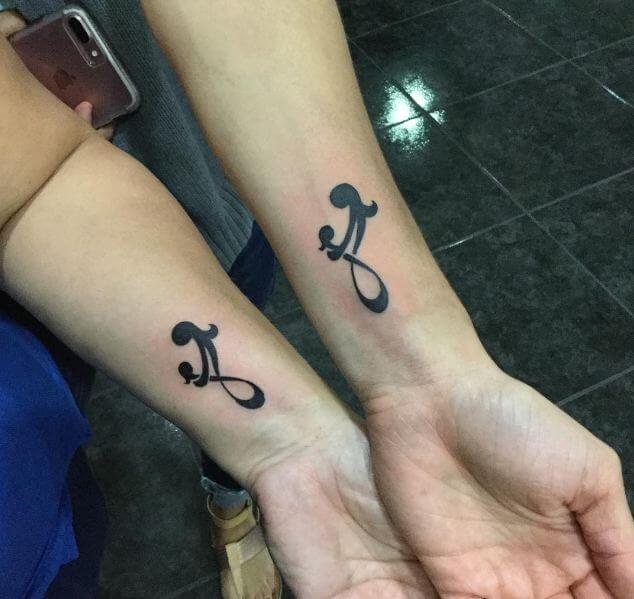 Mother And Daughters Matching Tattoos