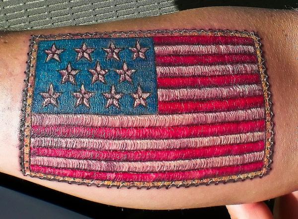 Stitched American Flag Tattoo On Forearm