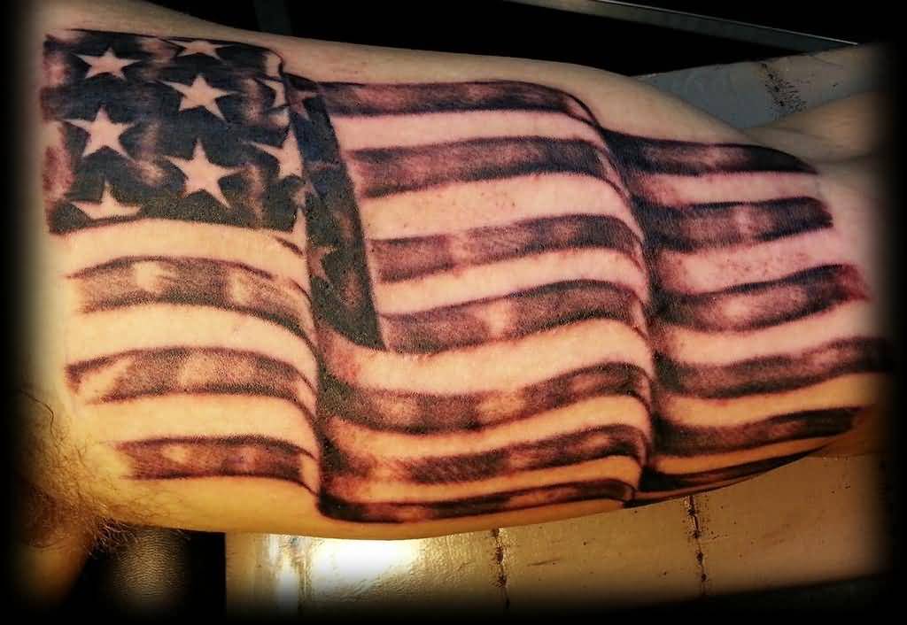 Superb Patriotic US Flag Tattoo On Biceps