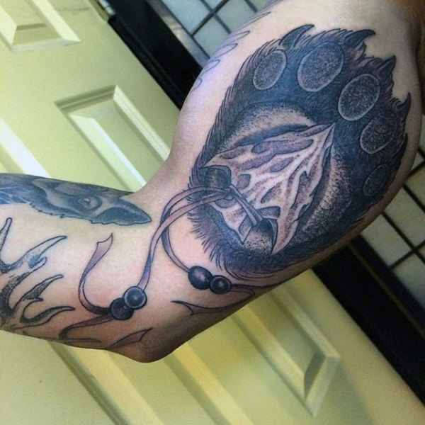 Fabulous Grey Arrowhead Tattoo On Arms For Men