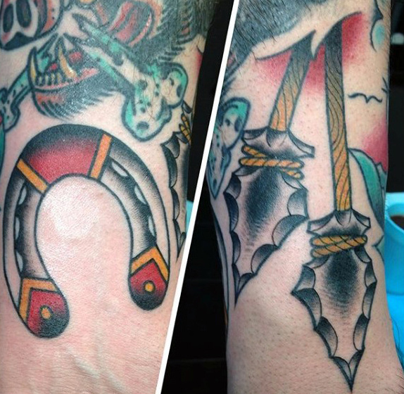 Mens Dangling Pair Of Arrowheads Tattoo On Calves