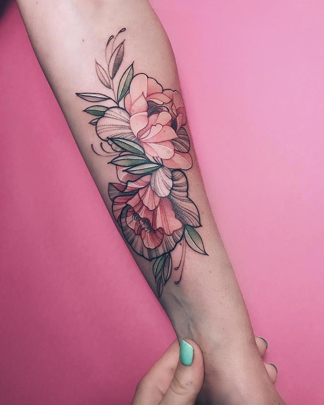 light pink wrist tattoo