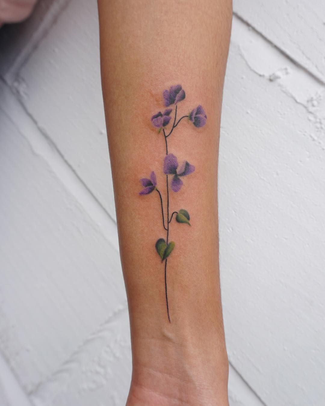 watercolor carnation tattoo.