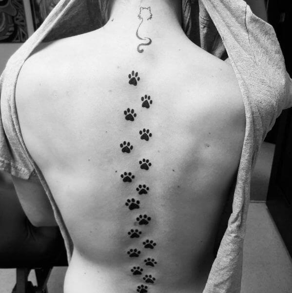 Cat With Paw Spine Tattoos For Girls