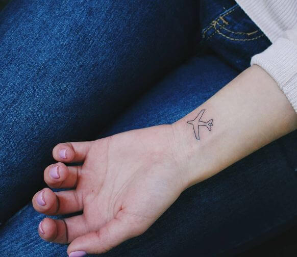 Tiny Airplane Girly Tattoos On Wrist