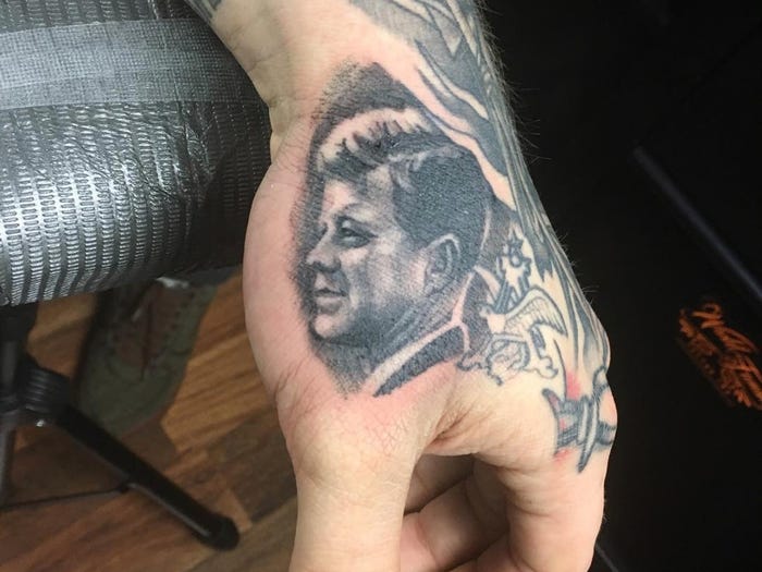 16 JFK Tattoo On Left Hand