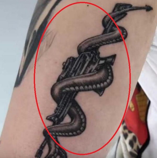 44 Gun With A Snake Tattoo
