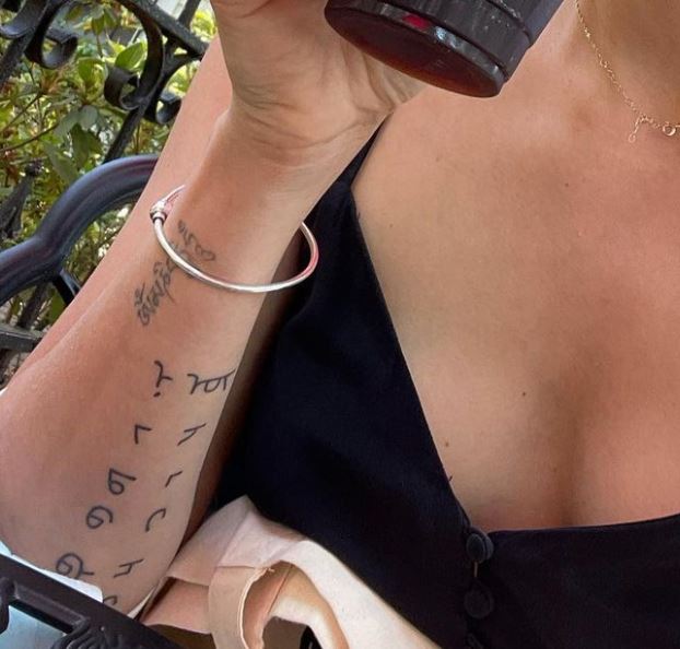 Jaimie Alexander Symbols Tattoo