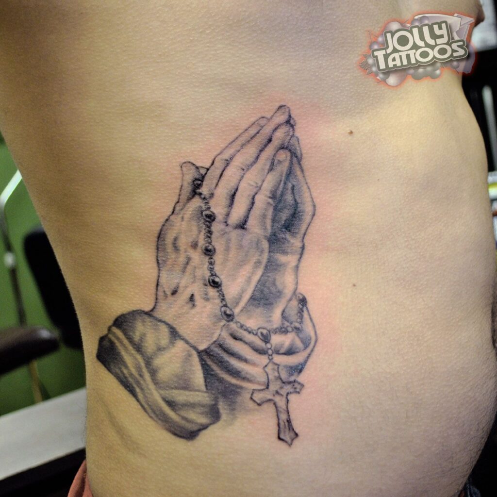 jesus hands praying tattoo