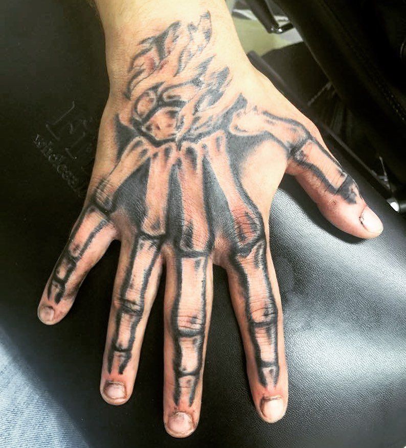 Skeleton Hand Tattoos 16